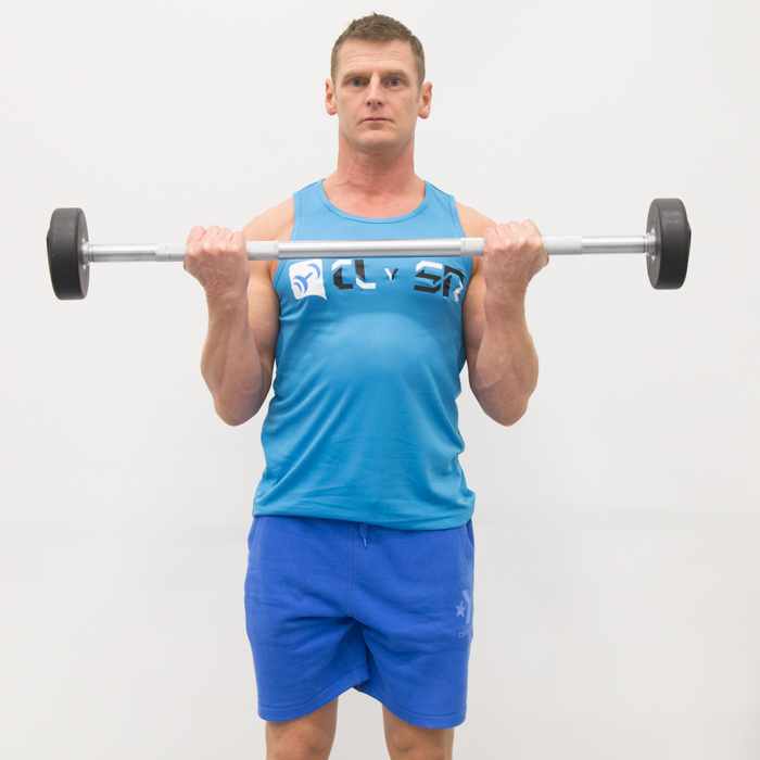 Строгий подъем на бицепс. Reverse Barbell Curls. Изогнутая штанга на бицепс. Подъем на бицепс с упором о стену.