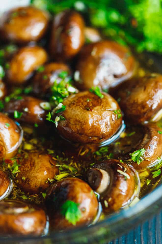 marinated mushrooms with the marinade in a bowl